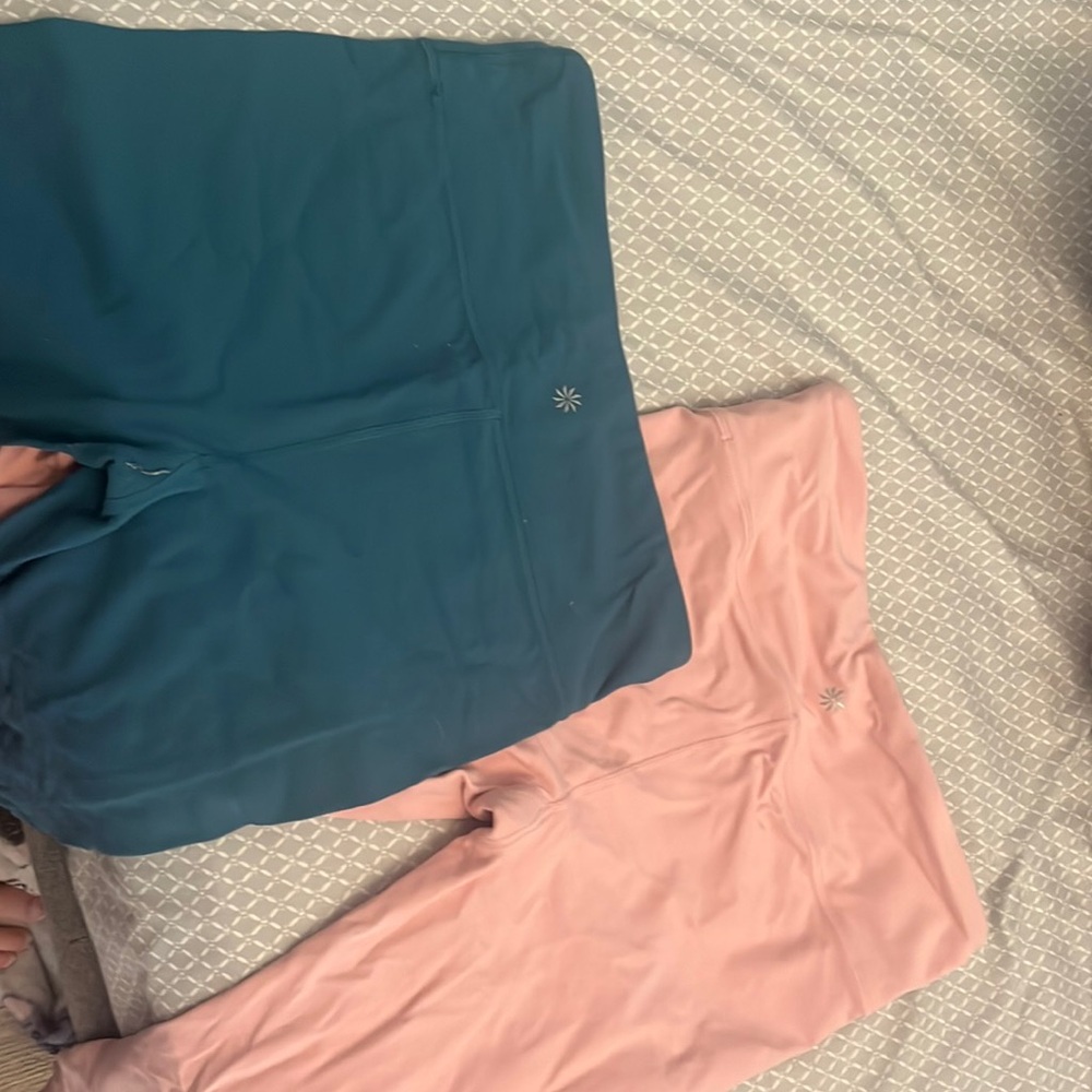 Pack of two Athleta girl leggings barely worn didn’t like the colors once again